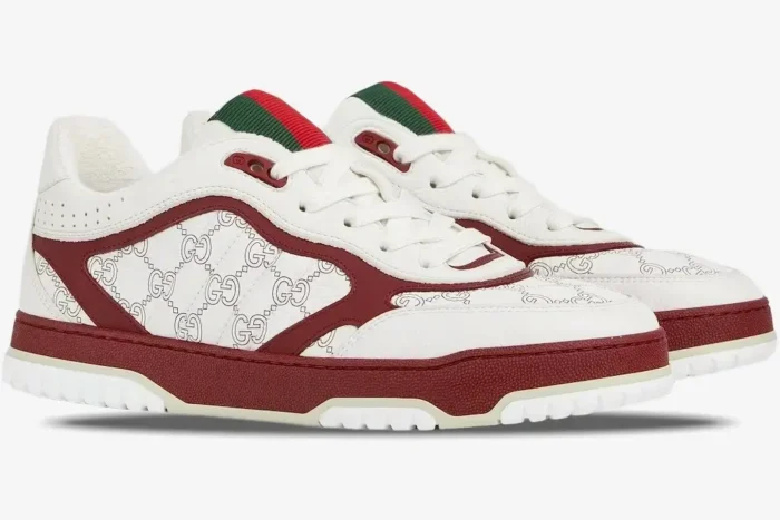 Gucci Re-Web sneakers in white and Rosso Ancora, side profile view showing interlocking G pattern. - SKU 850193AAFOO9043