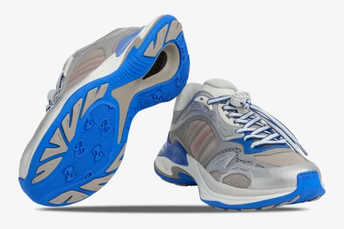 Gucci Run 2.0 grey and blue mesh technical runners, showing the side profile and textured blue outsole. - SKU 814040FAD5T8753