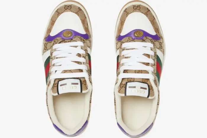Top-down view of Gucci Screener sneakers in beige GG canvas with white, purple, and green-red web details. - SKU 812638FAD3U9752