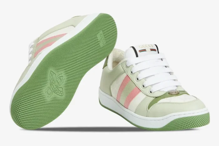 Gucci Screener GG Canvas sneakers in green, white, and pink, showing the front side and the green rubber sole. - SKU 806629FADXS9158