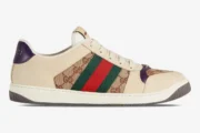 Gucci Screener GG Supreme sneaker in cream with green and red web stripe and purple heel, side view. - SKU 546551HVKI09765