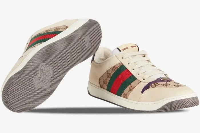 Gucci Screener GG Supreme sneakers with purple heel and web stripe, showing side and bottom sole views. - SKU 546551HVKI09765