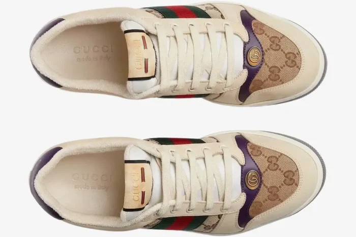 Top-down view of Gucci Screener GG Supreme sneakers in cream with vintage purple accents and web stripe. - SKU 546551HVKI09765