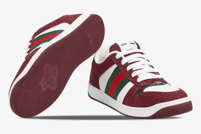 Gucci Screener Rosso Ancora GG Canvas sneakers in burgundy, showing side profile and bottom sole. - SKU 812638FAD7W8542