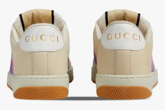 Back view of Gucci Screener white GG lamé women's sneakers with gold logo on white heel tabs. - SKU 5776842C8309150