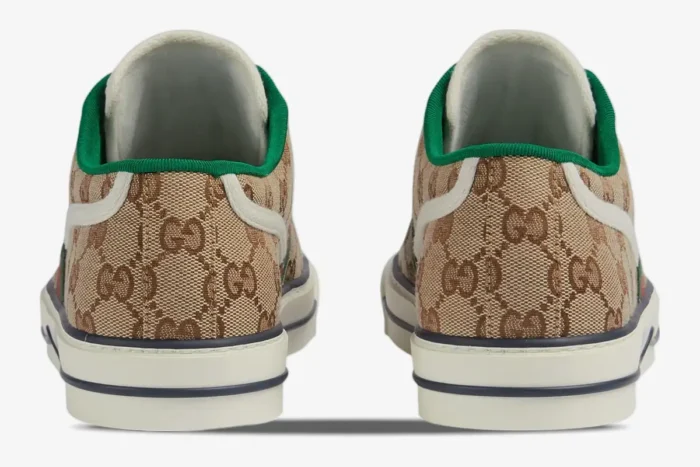 Back view of Gucci Tennis 1977 GG Supreme Canvas sneakers with green trim and white soles. - SKU 606111HVK209766