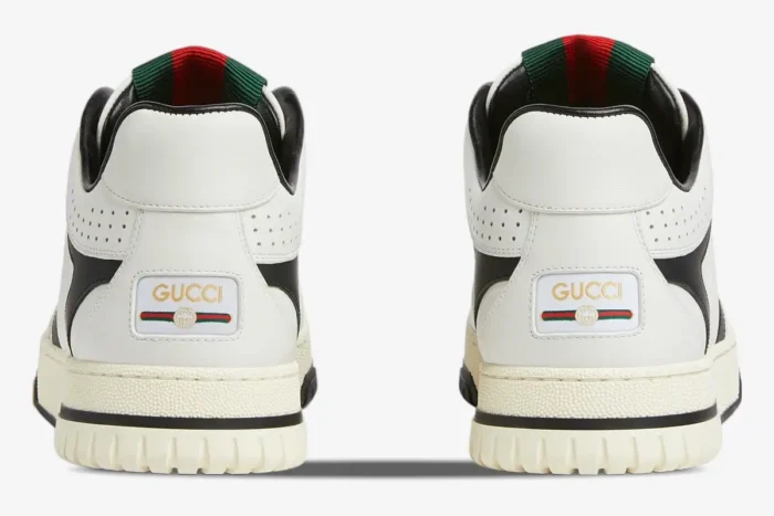 Rear view of Gucci Women's Re-Web sneakers in white and black, showing heel logos. - SKU 786186AADPM9055