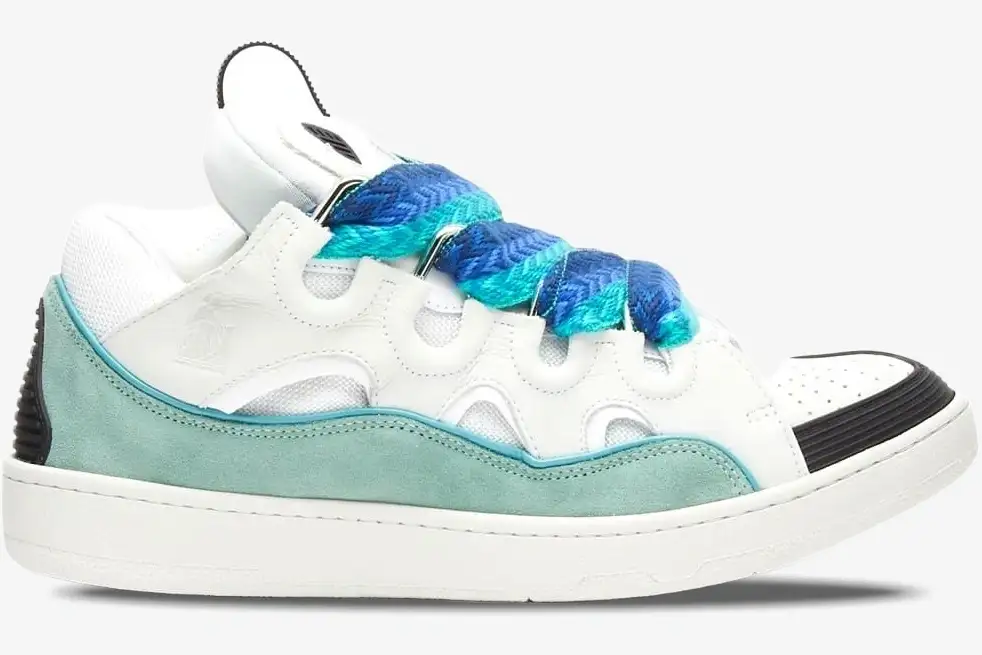 lanvin-curb-sneaker-white-blue-green-side-view-fm-skrk11-drag-h220040-750-955 Side profile of a Lanvin Curb Sneaker in white and green with chunky blue braided laces. - SKU FM-SKRK11-DRAG-H220040