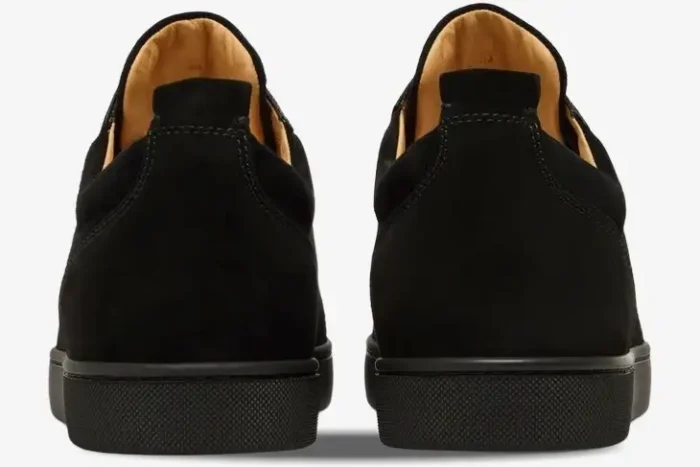 Rear view of Christian Louboutin Louis Junior black suede sneakers with tan leather lining. - SKU 1130575