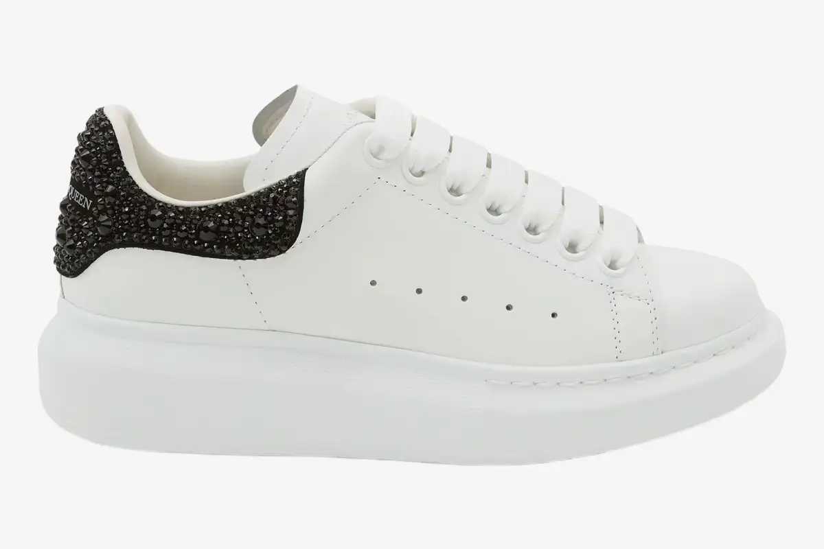 mcqueen-oversized-sneaker-white-black-glitter-side-666407wiaij9581-326-455 Alexander McQueen Oversized Sneaker in white with black crystal heel, side profile view. - SKU 666407WIAIJ9581