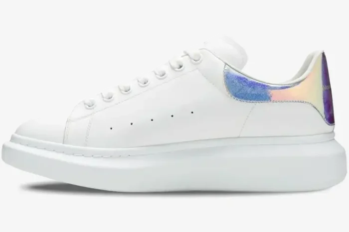 Alexander McQueen Oversized Sneaker in white with an iridescent heel tab, side profile view. - SKU 553680-WHX92-9123