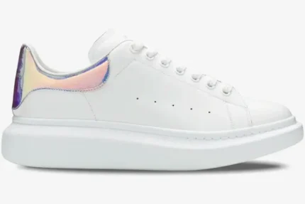 Side profile of Alexander McQueen Oversized Sneaker in white featuring an iridescent heel tab. - SKU 553680-WHX92-9123