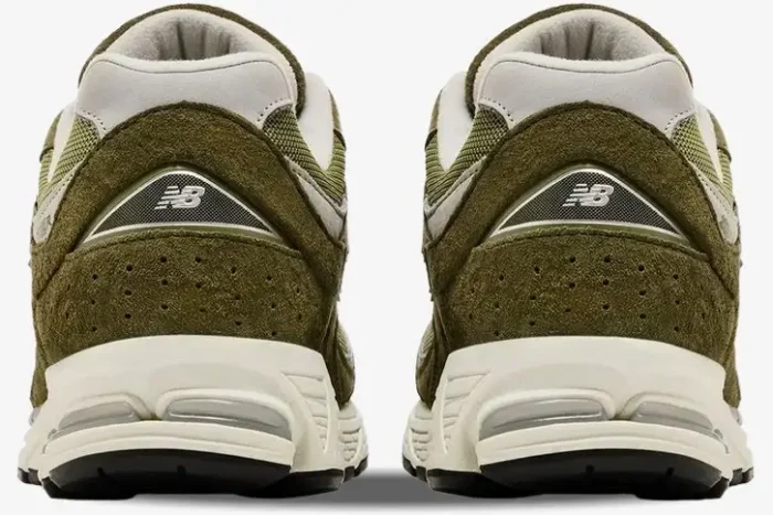 Rear view of New Balance 2002R x Footlocker Exclusive Green sneakers with olive suede and cream midsoles. - SKU M2002RFO