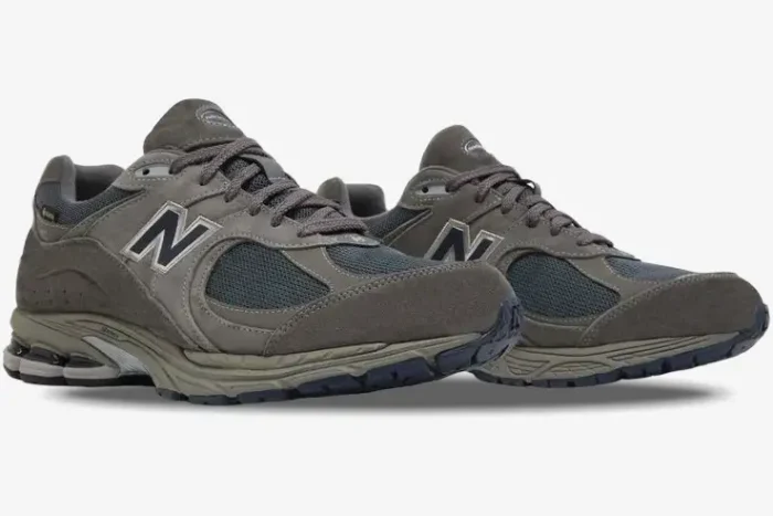 New Balance 2002R GORE-TEX sneakers in Castlerock Natural Indigo, three-quarter side view. - SKU M2002RXC