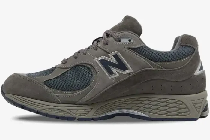 Side profile of a New Balance 2002R GORE-TEX sneaker in Castlerock Natural Indigo grey and navy. - SKU M2002RXC