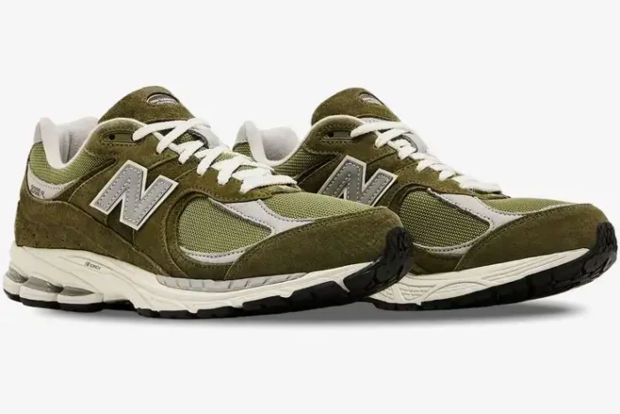 New Balance 2002R Footlocker Exclusive Green sneakers, side-profile view with mesh and suede. - SKU M2002RFO