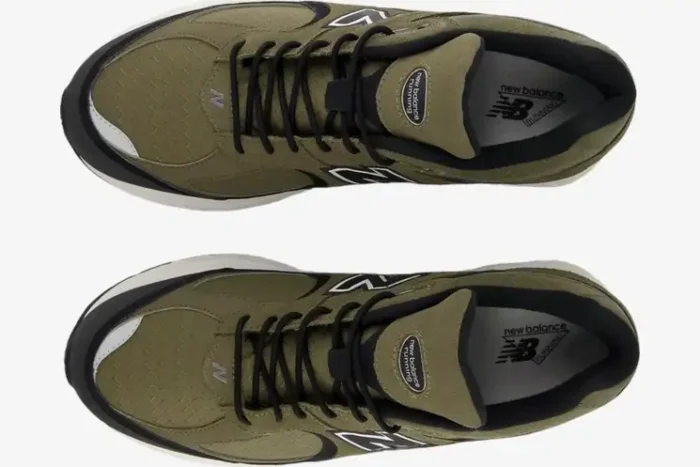 Top-down view of New Balance 2002R olive black premium suede sneakers featuring black laces and textured toe boxes. - SKU M2002RXU