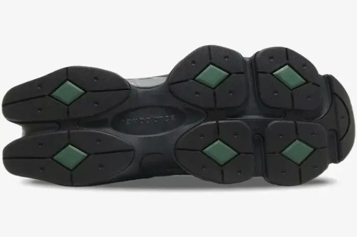 Bottom view of New Balance 9060 Forest Green Black outsole with diamond tread pattern. - SKU U9060VRA