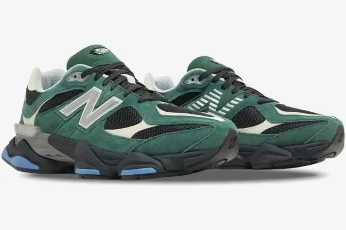 New Balance 9060 sneakers in forest green and black, shown from a three-quarter side angle. - SKU U9060VRA
