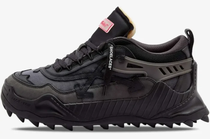Side profile of the Off-White ODSY-1000 'Black' 2023 sneaker with a chunky spiked sole. - SKU OWIA180C99FAB001-1000