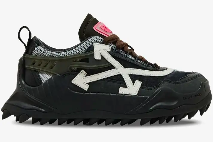 off-white-odsy-1000-black-white-side-view-owia180f21fab0021001-981-257 Side profile of Off-White ODSY-1000 sneakers in black and white with a chunky spiked sole. - SKU OWIA180F21FAB0021001
