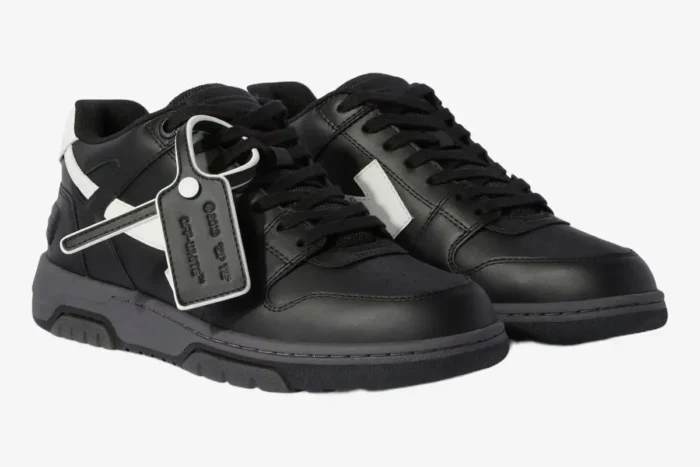 Off-White Out Of Office black and white leather sneakers in a three-quarter front view. - SKU OMIA189C99LEA0061001