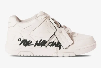 Side profile of Off-White Out Of Office 'For Walking' sneakers in white with black text and zip tie. - SKU OMIA189C99LEA0010110