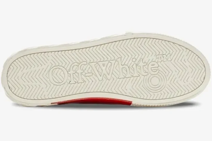 Bottom view of the white rubber sole on an Off-White Vulcanized Low Canvas sneaker with embossed logo. - SKU OMIA085C99FAB0070110
