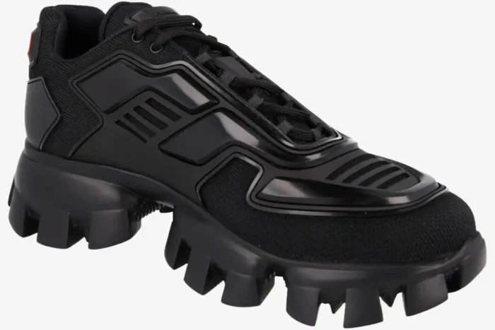 Prada Cloudbust Thunder knit black sculptural sneakers shown from a side three-quarter angle. - SKU 2EG293-3KZU-F0002