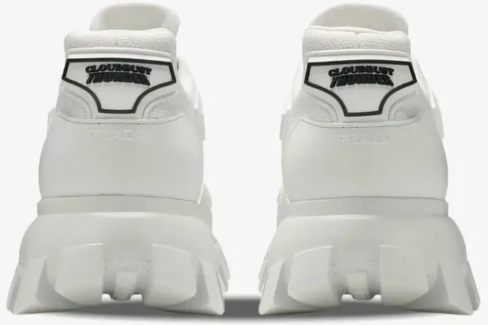 Rear view of white Prada Cloudbust Thunder Knit sneakers showing the chunky lug sole and heel logo. - SKU 2EG293-3KZU-F0009
