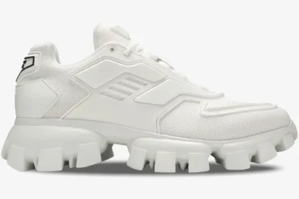 Prada Cloudbust Thunder Knit white sneaker in a side profile view with chunky lugged sole. - SKU 2EG293-3KZU-F0009