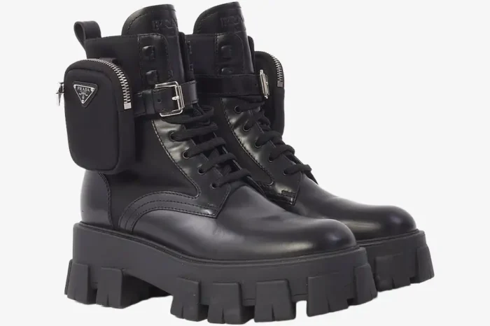 Black Prada Monolith leather boots with chunky soles and detachable pouches, side view. - SKU 1T255M_3L09_F0002_F_055