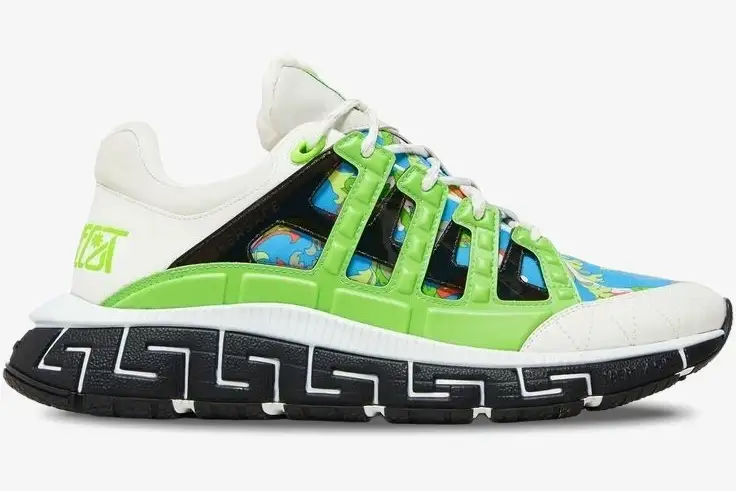versace-trigreca-baroccofest-blue-green-side-dsu8094-1a02706-6v250-073-696 Side view of Versace Trigreca Baroccofest sneakers in blue and green with a black Greek key patterned sole. - SKU DSU8094-1A02706-6V250